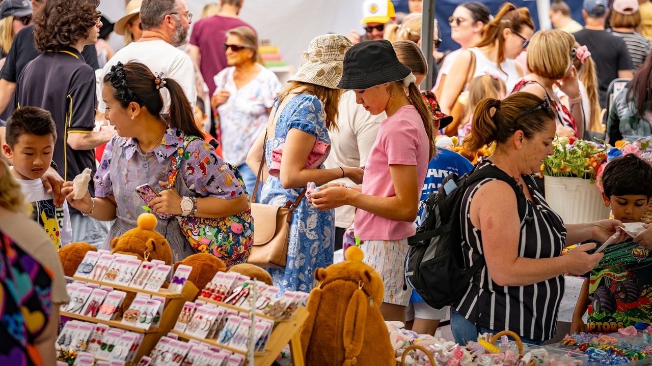 Customers buying from local artists